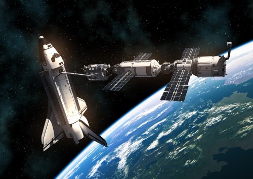space-shuttle-i-miedzynarodowa-stacja-kosmiczna-na-tle-planety-ziemia