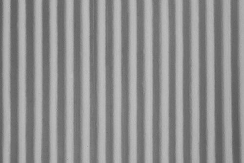 biala-i-szara-falista-powierzchnia-wzor-linii-rownoleglych