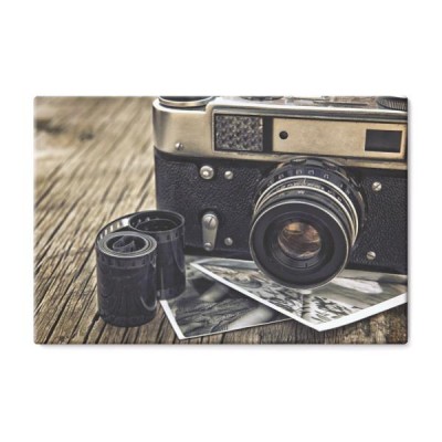 stary-vintage-zblizenie-kamery-na-drewniane-tla