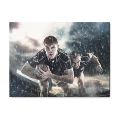 zawodnicy-rugby-graja-na-stadionie-w-deszczu
